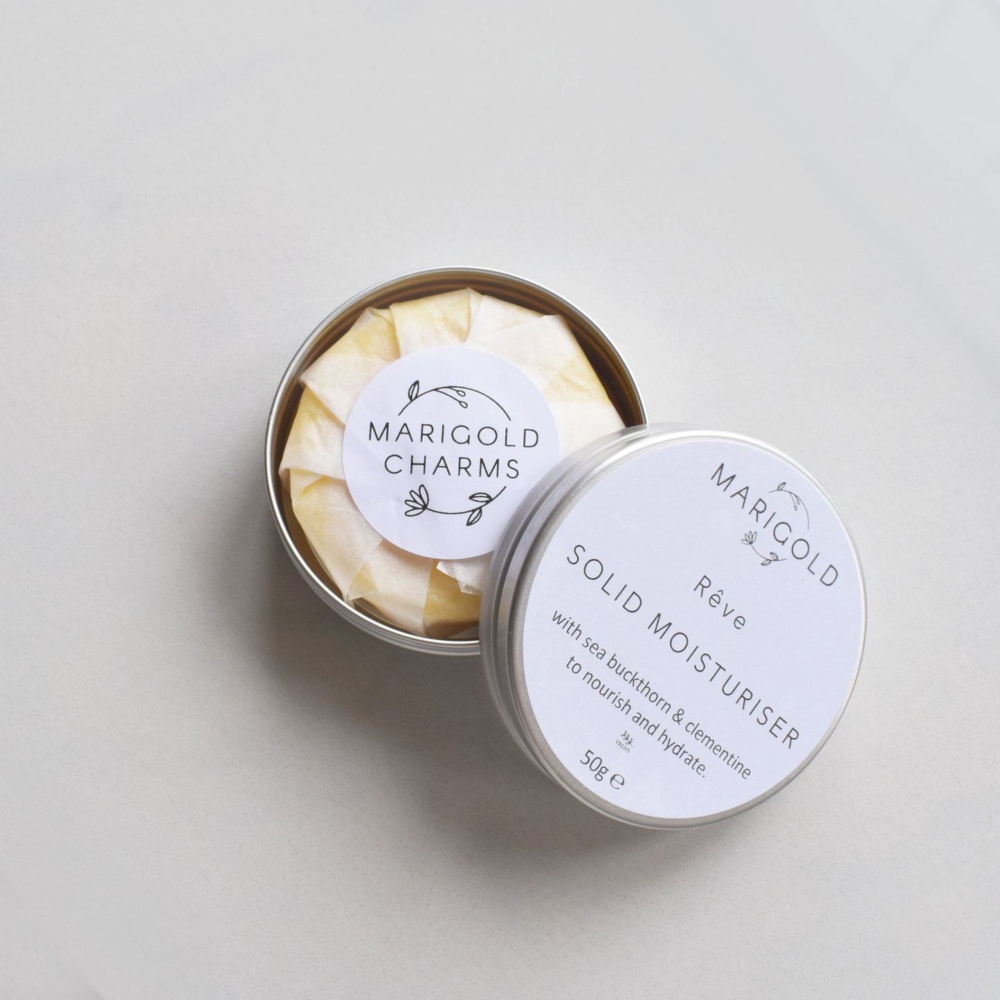 Marigold Charms Sweet clementine Vegan Solid Moisturiser Bar iopen tin wrapped