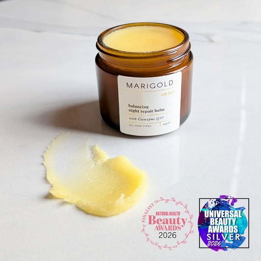 open jar of balancing night repair balm 