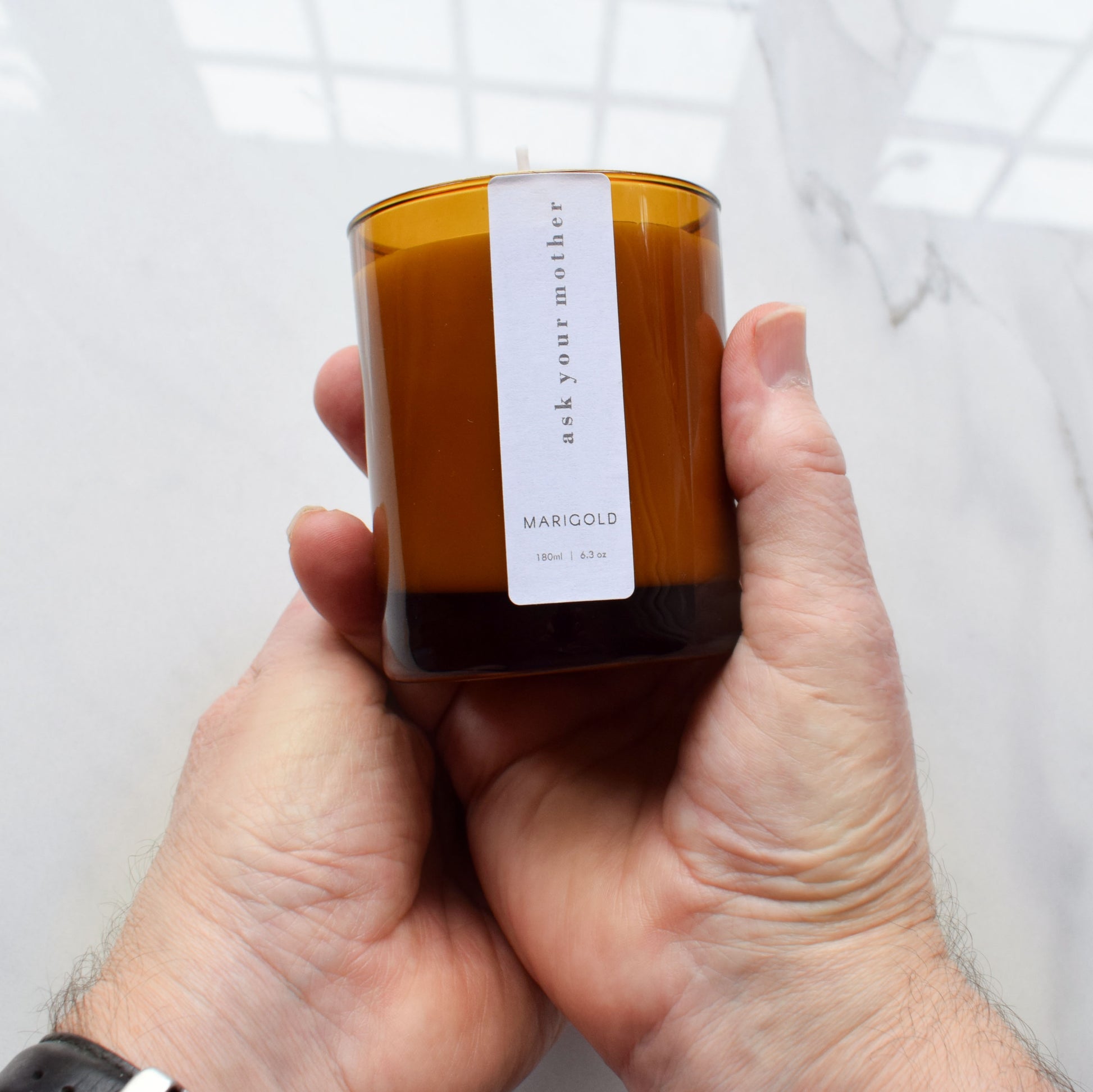 Ask Your Mother Scented Eco Soy Wax Candle being held