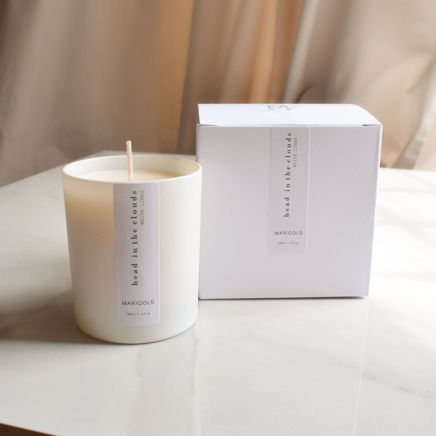 180ml Head In The Clouds Wellbeing Aromatherapy Candle and box