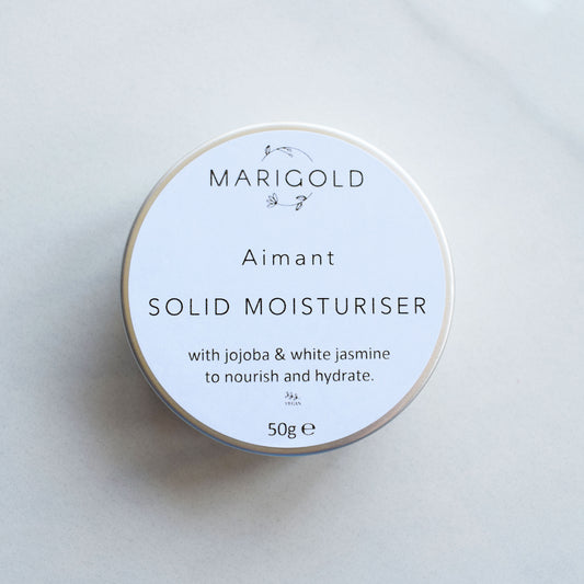 Marigold Charms Jasmine Vegan Solid Moisturiser Bar in a tin