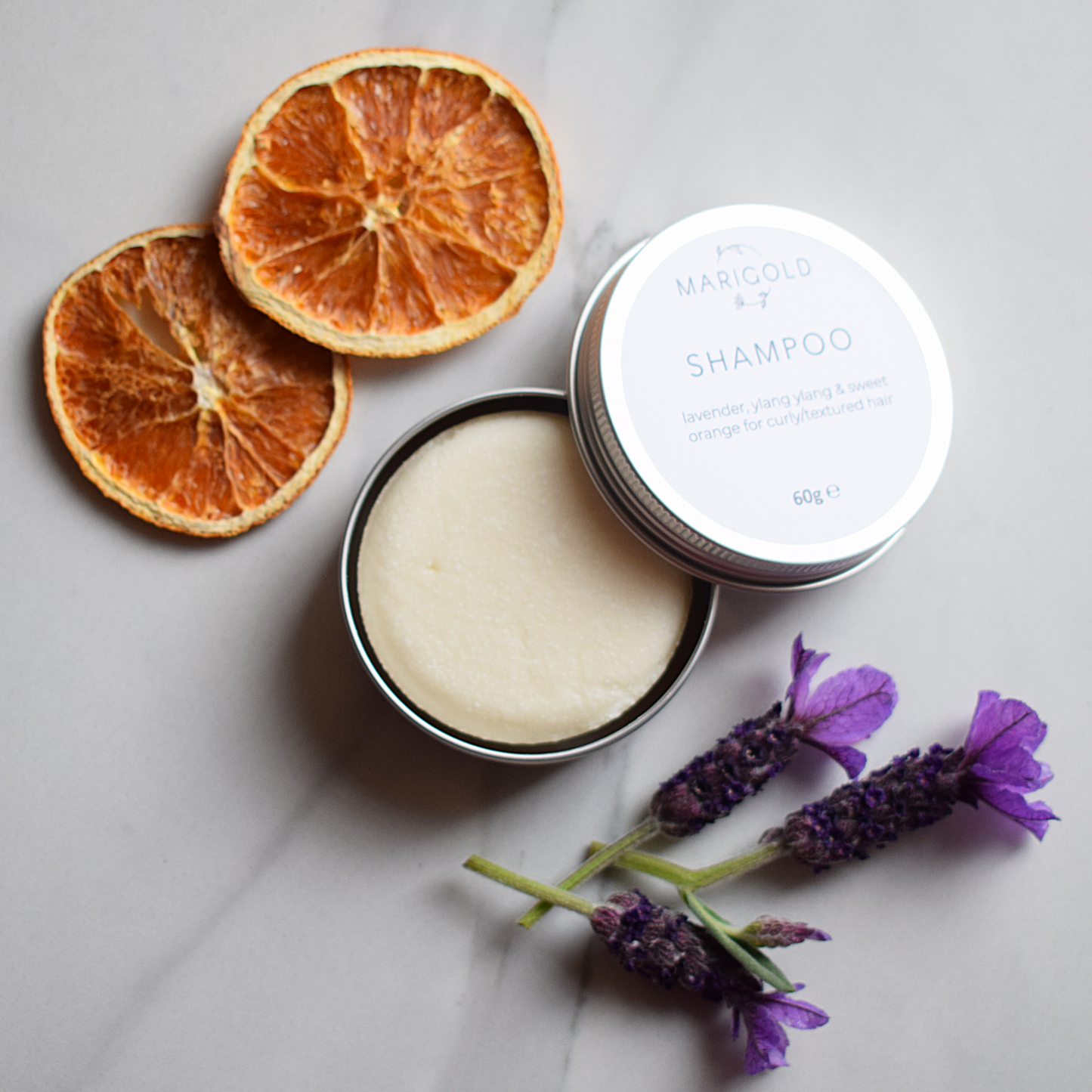 Lavender, Ylang Ylang and Sweet Orange Solid Shampoo Bar open tin