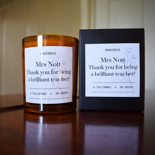 Personalised Thank you Teacher Candle and packaging  on a wooden surface