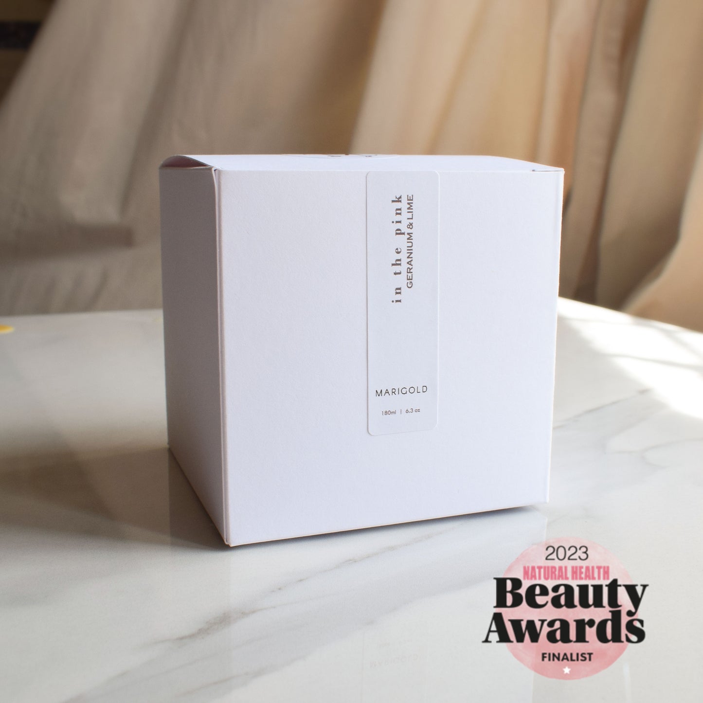 In the Pink Wellbeing Aromatherapy Candle boxed