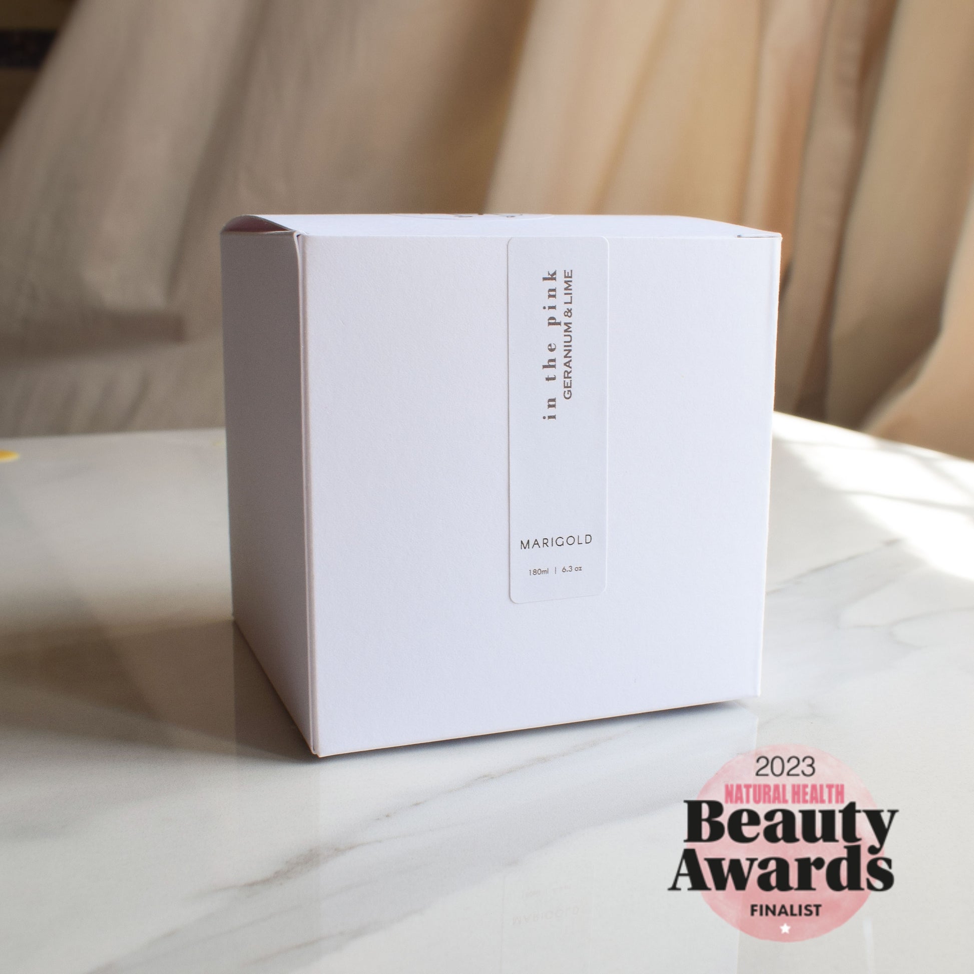 In the Pink Wellbeing Aromatherapy Candle boxed