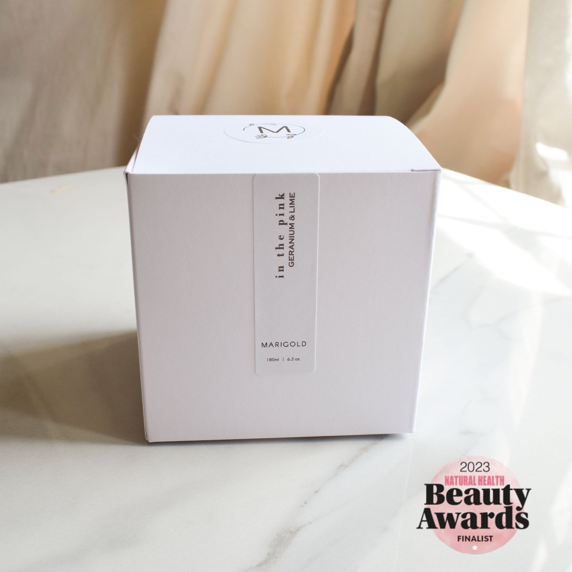 In the Pink Wellbeing Aromatherapy Candle boxed